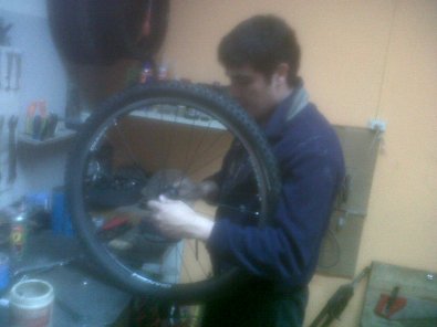 Cesar, fixing my bike.